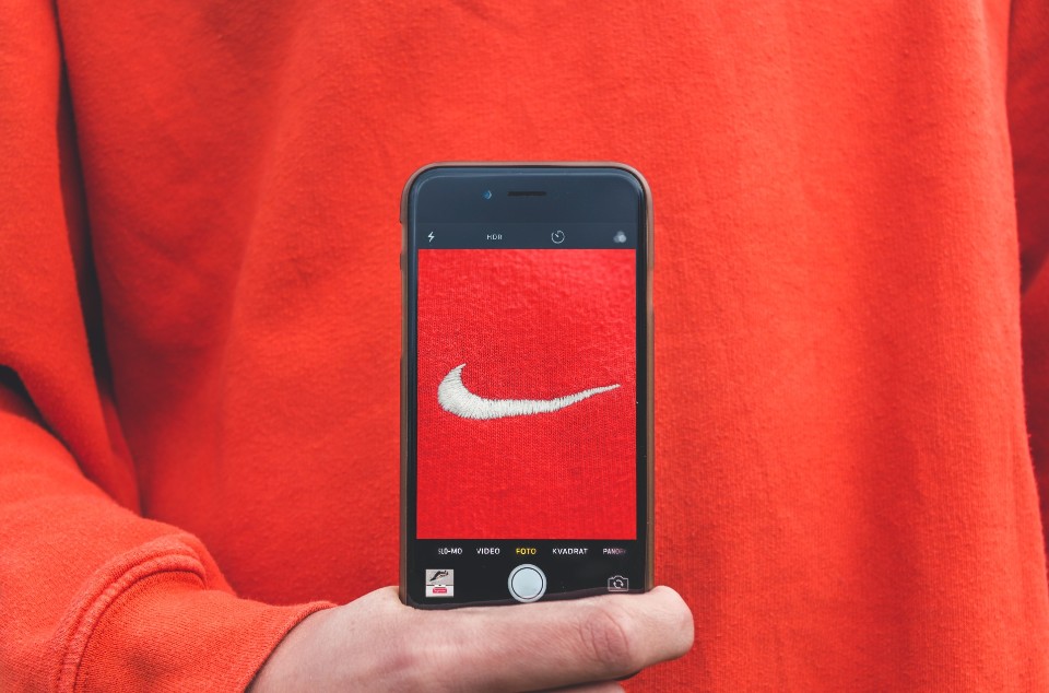 Nike logo as shown through a phone screen