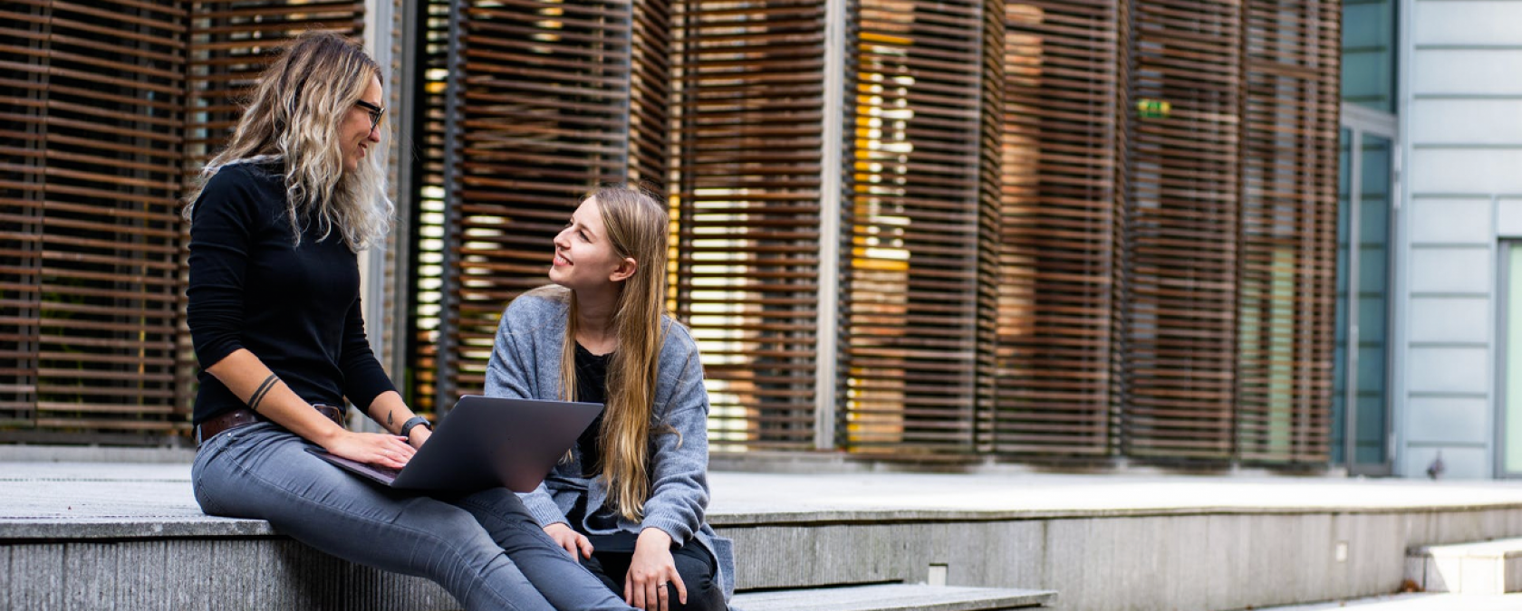 two young female students chatting